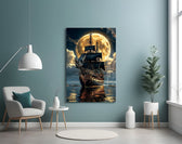 tall sailing ship before a full moon glass wall art styled above an armchair in a reading corner