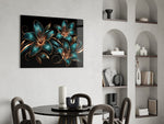 teal and copper line-art lilies glass wall art leaning beside a dark leather sofa