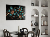 teal and copper line-art lilies glass wall art leaning beside a dark leather sofa