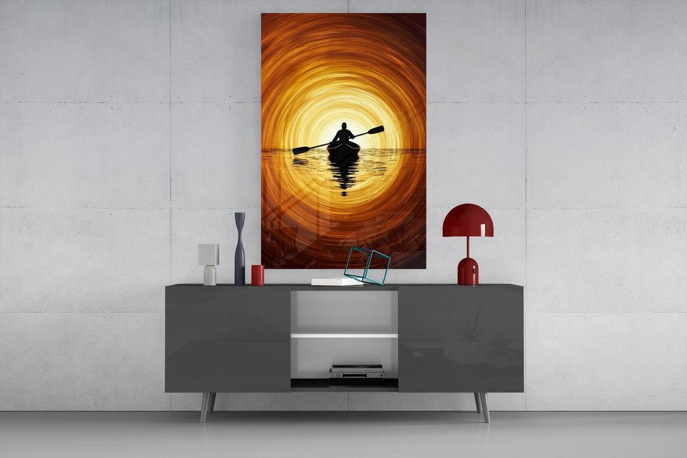 a lone kayaker at golden sunset glass wall art styled in an atmospheric room setting