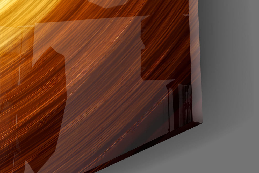 Close-up detail of the rippling gold water and the raised paddle mid-stroke on the glass surface