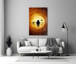 a lone kayaker at golden sunset panel bringing character to a minimalist living room wall