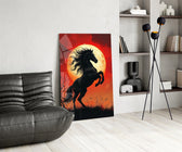 a rearing black horse under a red moon glass wall art leaning beside a dark leather sofa