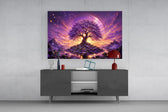 a purple tree of life at glowing sunset glass wall art styled in an atmospheric room setting