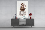 a latte-art coffee cup with hand lettering glass wall art styled in an atmospheric room setting