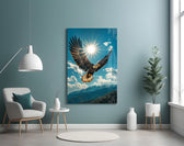 a bald eagle before a bright sunburst glass wall art styled above an armchair in a reading corner