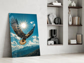 a bald eagle before a bright sunburst panel resting in a shelving niche in a modern interior
