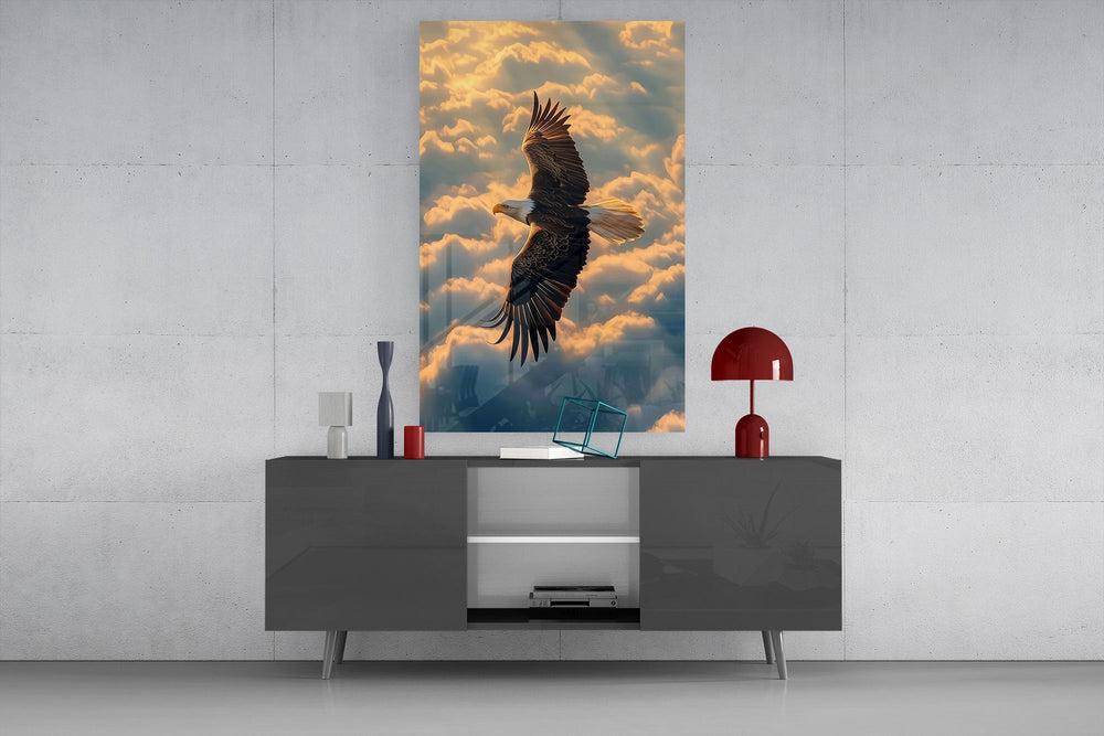 a bald eagle soaring above golden clouds glass wall art styled in an atmospheric room setting