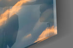 Close-up detail of the side-lit wings and the sea of sunlit cloud on the glass surface