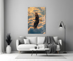 a bald eagle soaring above golden clouds panel bringing character to a minimalist living room wall