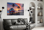 a retro camper van on a beach at sunset glass wall art styled above an armchair in a reading corner