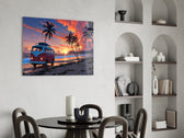 a retro camper van on a beach at sunset glass wall art leaning beside a dark leather sofa