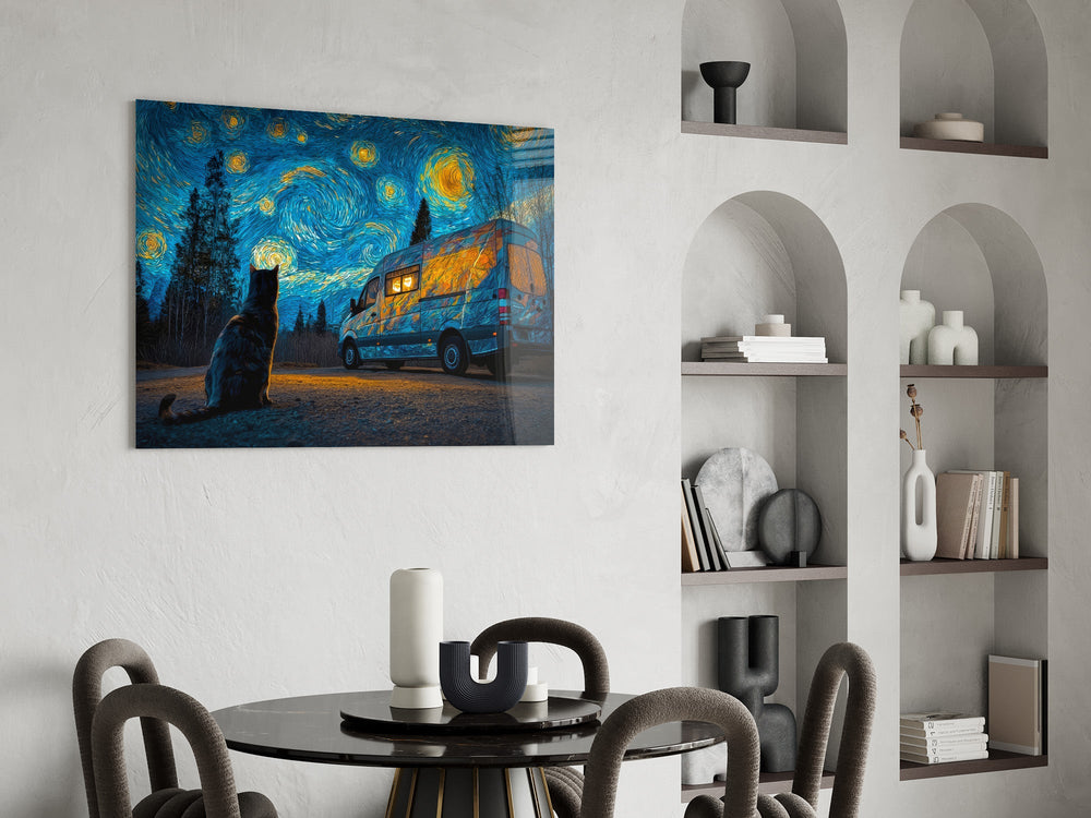 a cat watching a camper van under a swirling starry sky glass wall art leaning beside a dark leather sofa