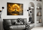 a golden tree of life before a radiant sun disc glass wall art styled above an armchair in a reading corner