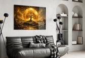 a golden tree of life before a radiant sun disc glass wall art styled above an armchair in a reading corner