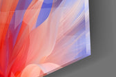 Close-up detail of the layered violet and coral translucent petals on the glass surface
