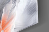 Close-up detail of the silvery white petals and warm coral heart on the glass surface