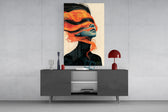 windswept orange hair over a blue-toned portrait glass wall art styled in an atmospheric room setting