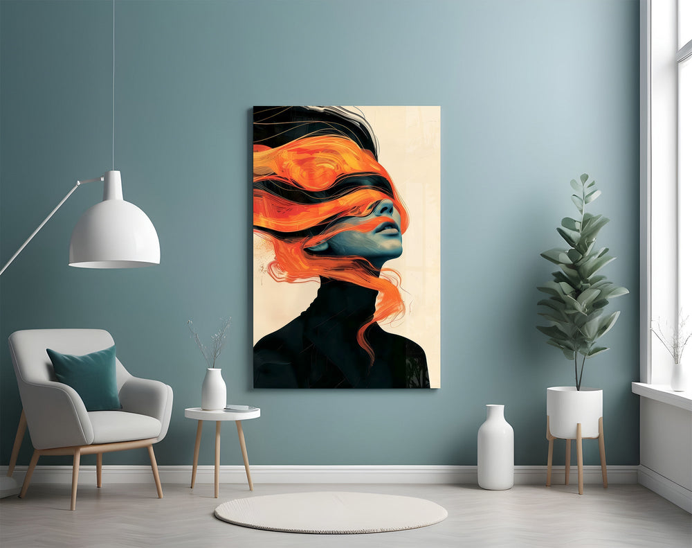 windswept orange hair over a blue-toned portrait glass wall art styled above an armchair in a reading corner