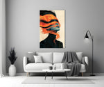 windswept orange hair over a blue-toned portrait panel bringing character to a minimalist living room wall