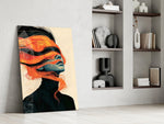 windswept orange hair over a blue-toned portrait panel resting in a shelving niche in a modern interior