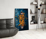 a wooden rowboat full of sunflowers on dark water glass wall art leaning beside a dark leather sofa