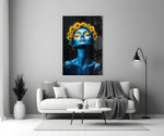 a blue-skinned woman crowned with sunflowers panel bringing character to a minimalist living room wall