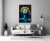 a blue-skinned woman crowned with sunflowers panel bringing character to a minimalist living room wall