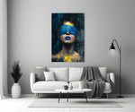 a blindfolded woman with blue lips and dripping paint panel bringing character to a minimalist living room wall