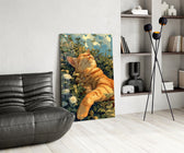 a ginger cat basking in a wildflower meadow glass wall art leaning beside a dark leather sofa