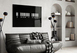 I dont care barcode statement glass wall art styled above an armchair in a reading corner