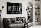 I have money I break rules dollar type glass wall art styled above an armchair in a reading corner