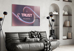 iridescent chrome wave affirmation glass wall art styled above an armchair in a reading corner