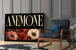 anemone bloom typography panel resting in a shelving niche in a modern interior