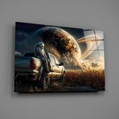 astronaut resting against a pickup truck glass wall art angled to show the polished tempered glass panel