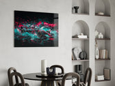teal and pink open-wheel race car glass wall art leaning beside a dark leather sofa