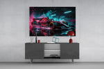 red open-wheel race car with cyan light streaks glass wall art styled in an atmospheric room setting