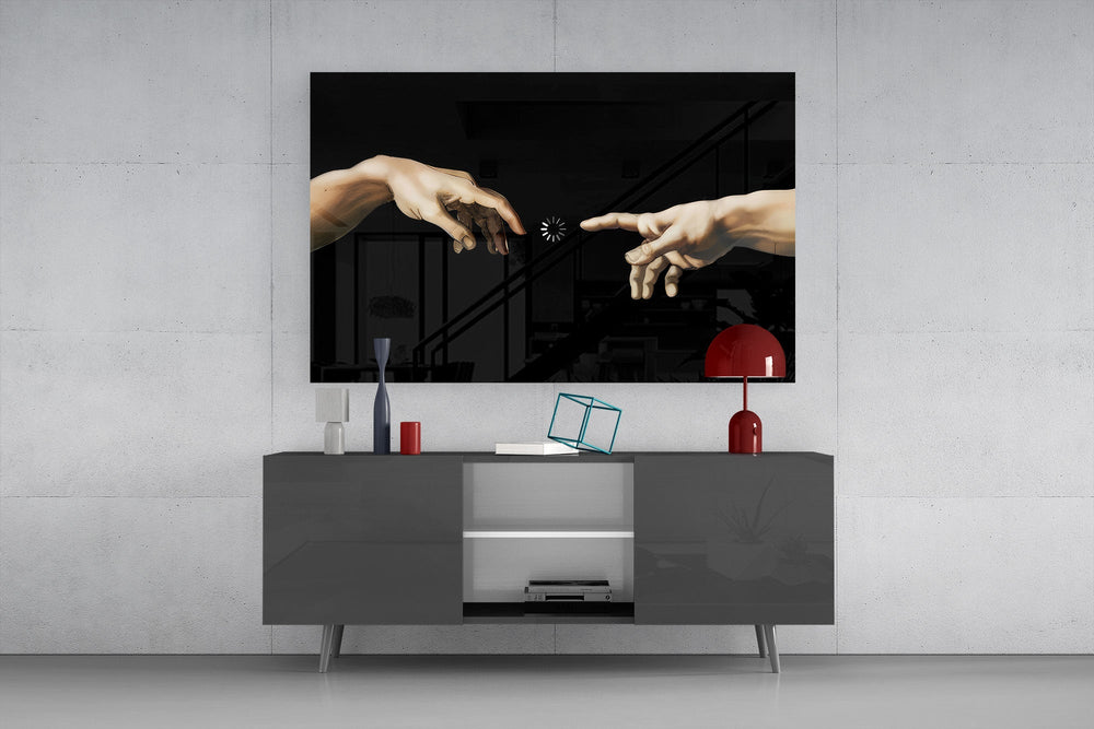two reaching hands with a loading spinner glass wall art styled in an atmospheric room setting