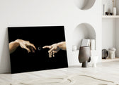 two reaching hands with a loading spinner panel bringing character to a minimalist living room wall
