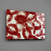 red lipstick kiss prints glass wall art angled to show the polished tempered glass panel