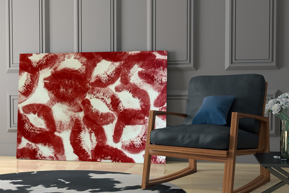 red lipstick kiss prints panel resting in a shelving niche in a modern interior
