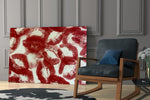 red lipstick kiss prints panel resting in a shelving niche in a modern interior