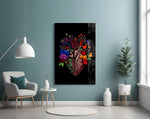 floral anatomical heart glass wall art styled above an armchair in a reading corner