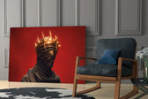 faceless figure with a glowing thorn crown panel resting in a shelving niche in a modern interior