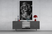vintage blonde bombshell portrait glass wall art styled in an atmospheric room setting