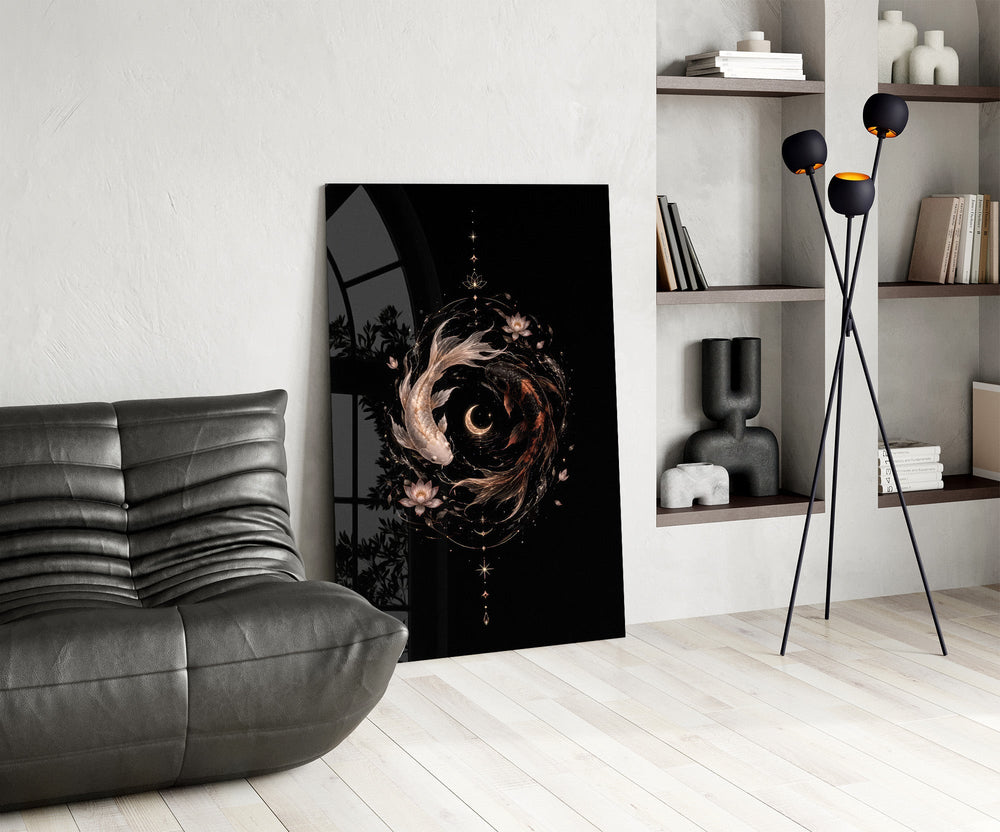 celestial koi yin yang with a crescent moon glass wall art leaning beside a dark leather sofa