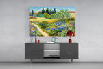 impressionist flower garden with a path glass wall art styled in an atmospheric room setting