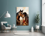 a native woman resting against her horse glass wall art styled above an armchair in a reading corner