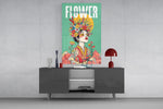 a woman crowned with wildflowers glass wall art styled in an atmospheric room setting
