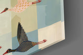 Close-up detail of the dotted and striped patterned wings on the glass surface